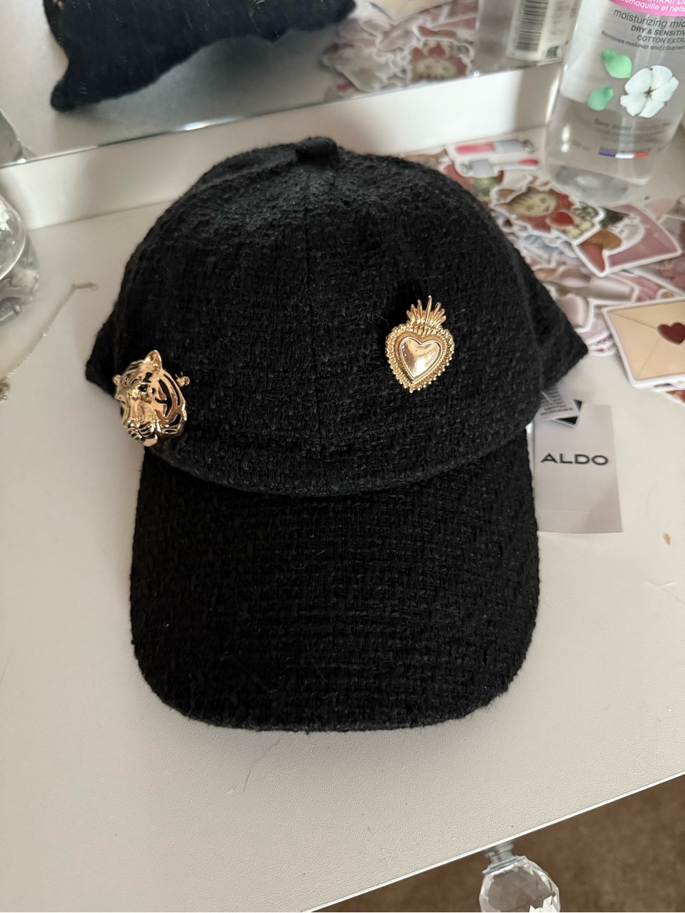Aldo Black Textured Cap with Gold Heart and Tiger Pins